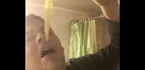  Faggot eats cum filled condom